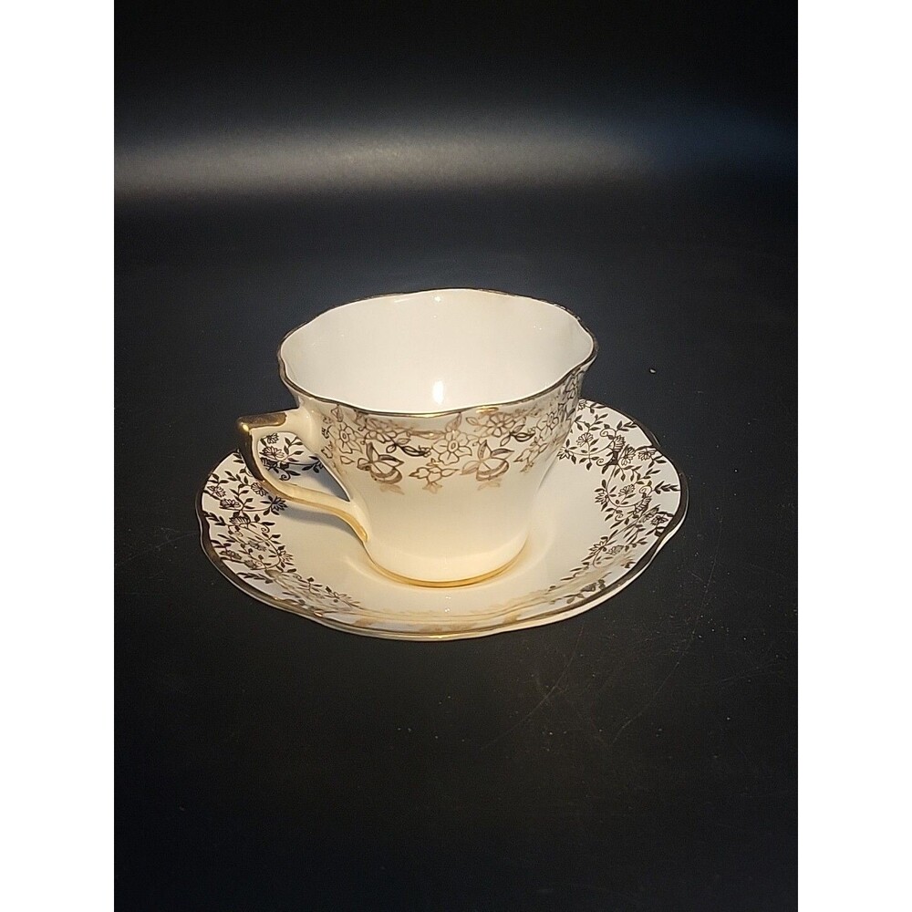 Marlboro Filigree Floral Gold And White Teacup & Saucer Bone China England